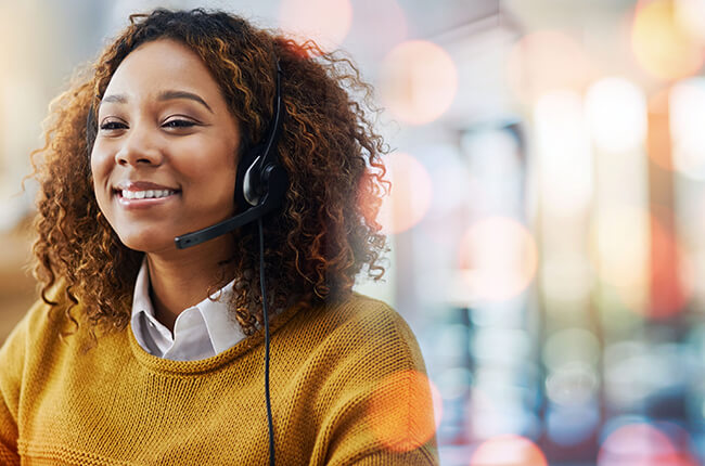 Woman smiling with headset